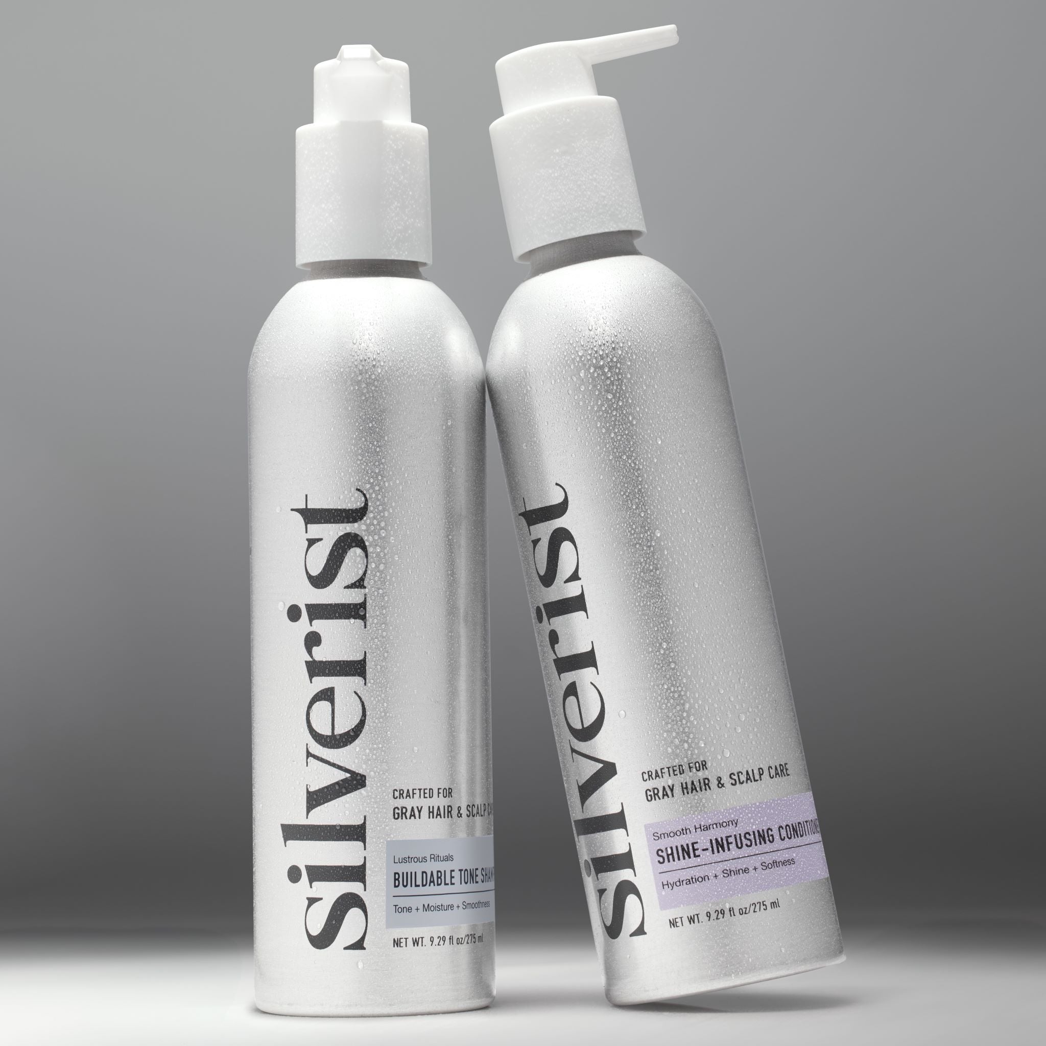 Two bottles of Silverist shampoo and conditioner, one with a pump dispenser and one with a spray nozzle, both labeled for silver, gray, and white hair.