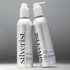 Two bottles of Silverist shampoo and conditioner, one with a pump dispenser and one with a spray nozzle, both labeled for silver, gray, and white hair.