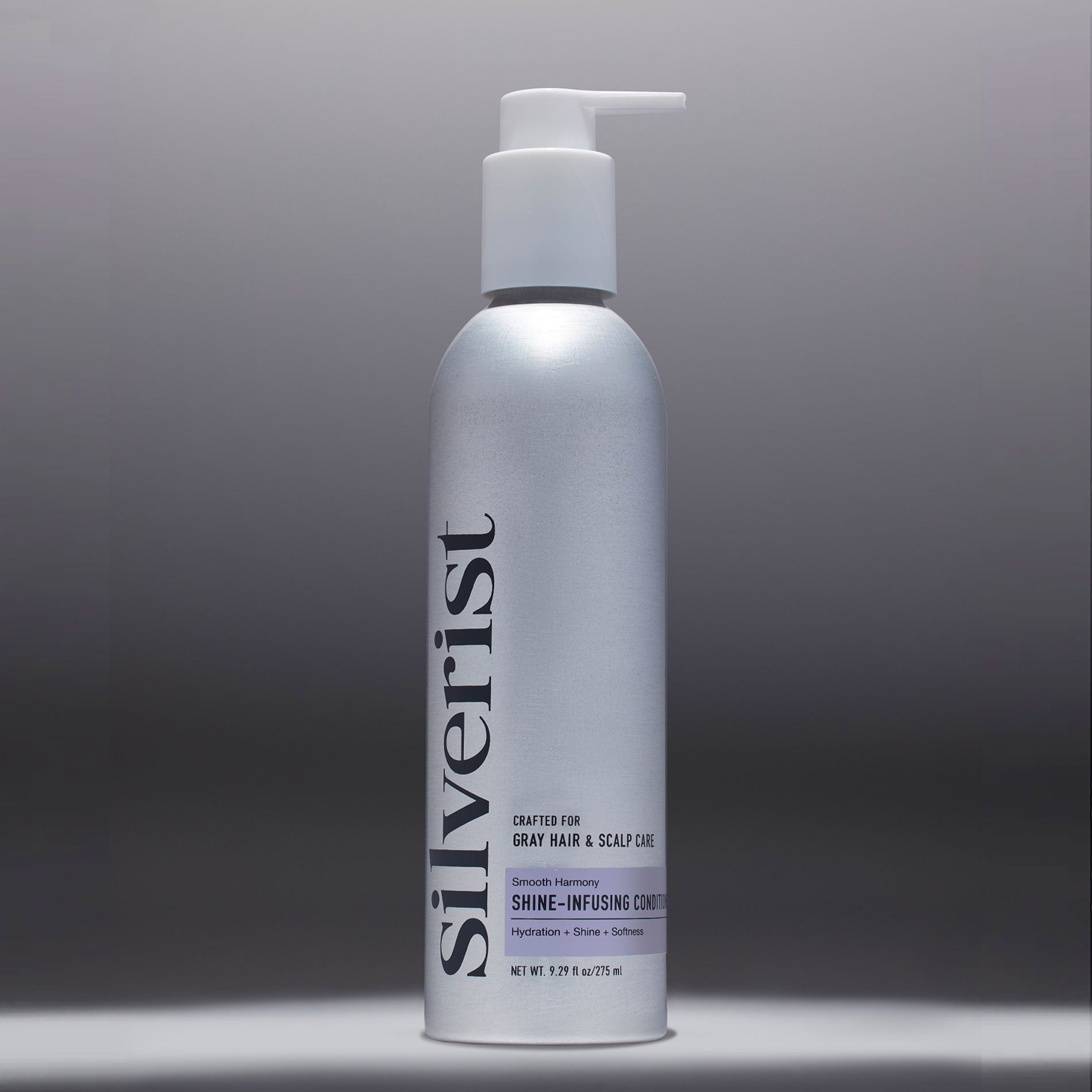 A pump bottle of Silverist Shine-Infusing Conditioner for gray and silver hair.