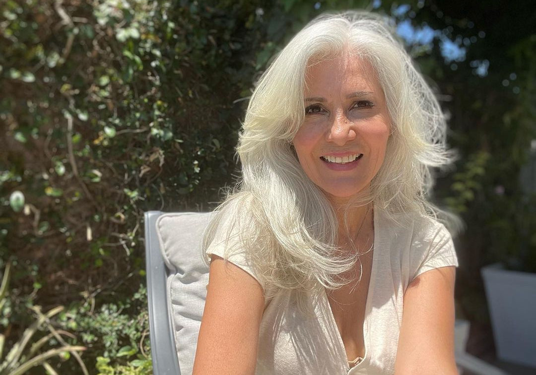 Edith Aguirre embracing her silver hair