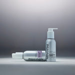 Travel size Silverist shampoo and conditioner bottles on a background with a gradation