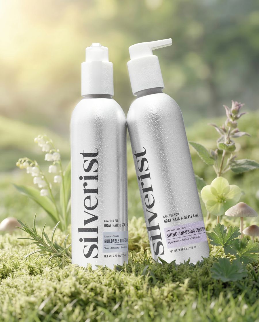 Two bottles of 'silverist' products on a grassy background with flowers.